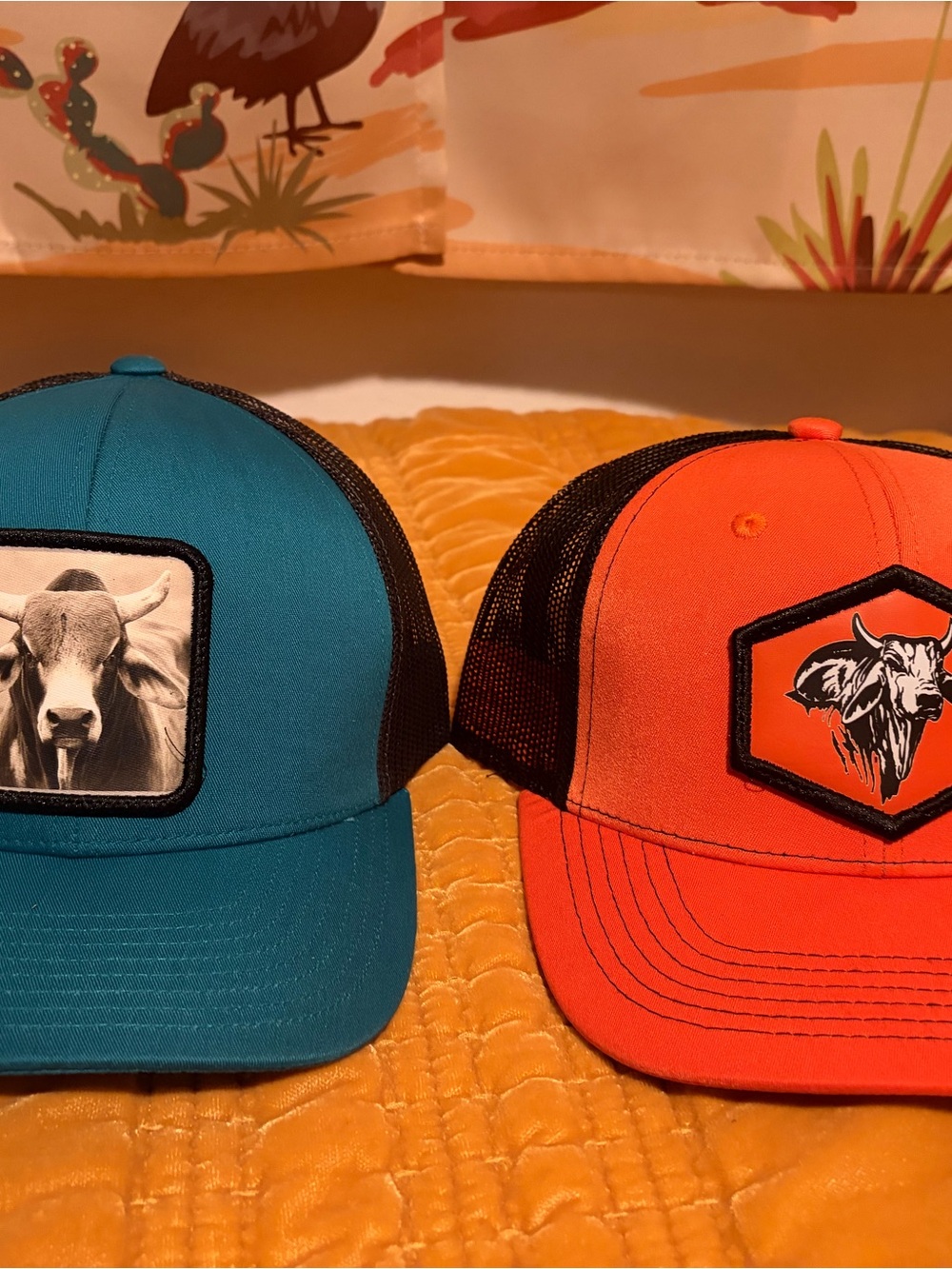 Cow Patch Trucker Hats — Teal & Orange